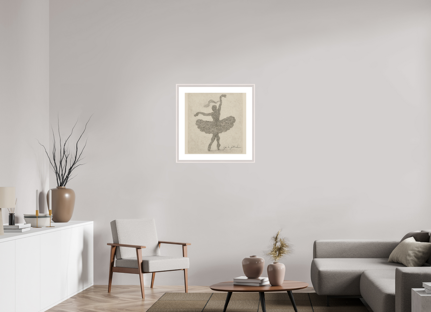 Framed artwork of a dancer on a wall in a modern living room.